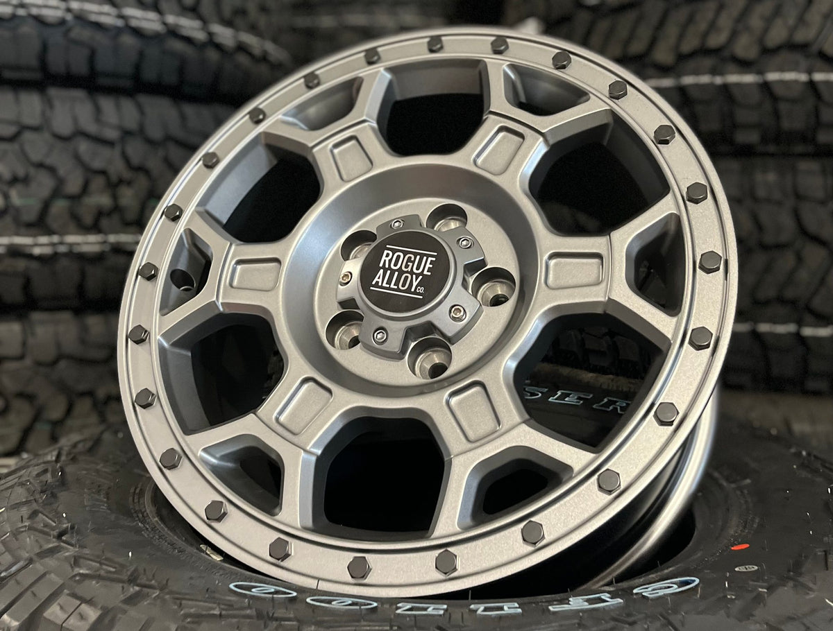 A six-stud Rogue wheel showing the stud holes around the branded centre cap