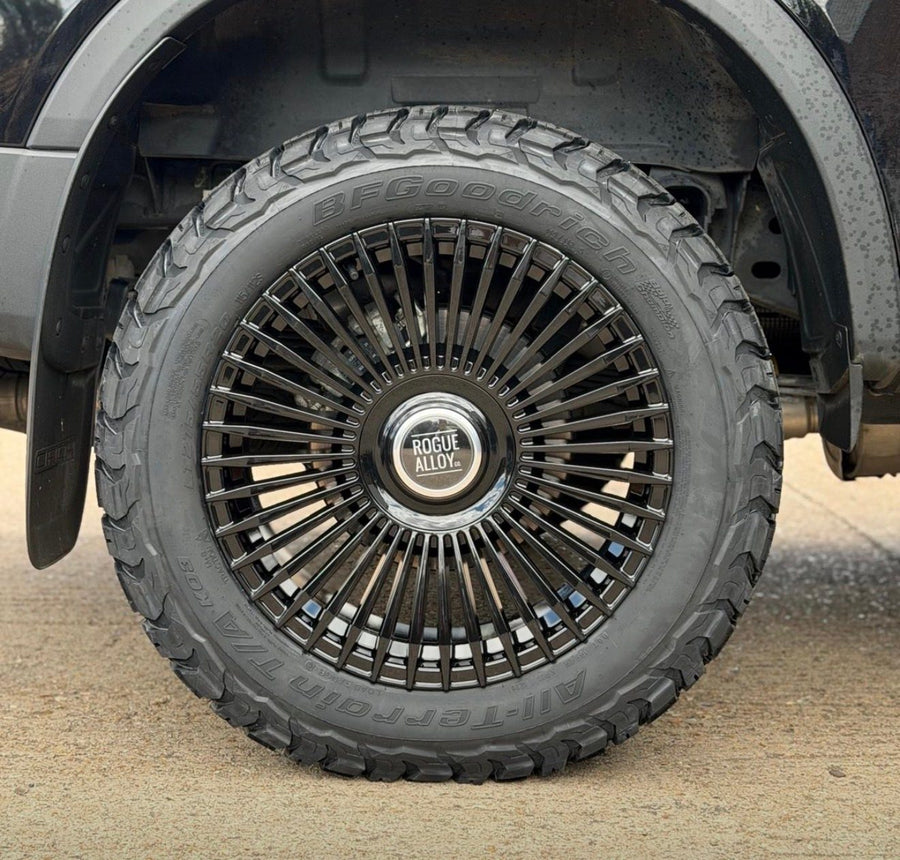 Black Rogue Regal multi-spoke wheel with BFGoodrich all-terrain tyre on a pickup
