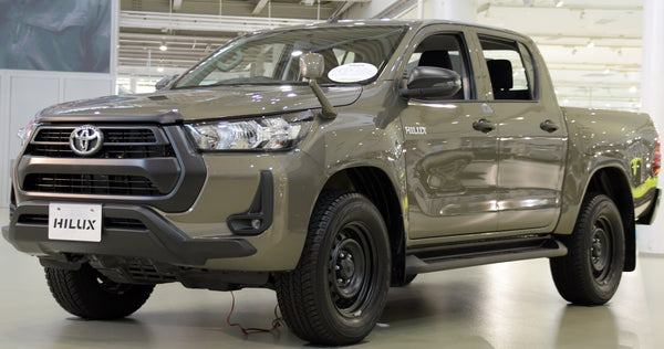 Toyota Hilux GUN125 double-cab pickup on factory steel wheels, photographed in 2021